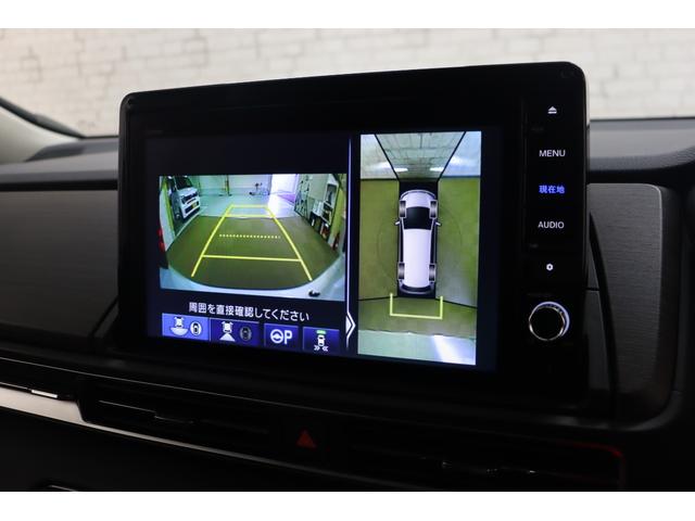 オデッセイハイブリッド ｅ：ＨＥＶアブソルート・ＥＸ　ハイブリッド　ドライブレコーダー　全周囲カメラ　ナビ　ＴＶ　両側電動スライドドア　クリアランスソナー　クルーズコントロール　レーンアシスト　パークアシスト　衝突被害軽減システム　オートライト（3枚目）