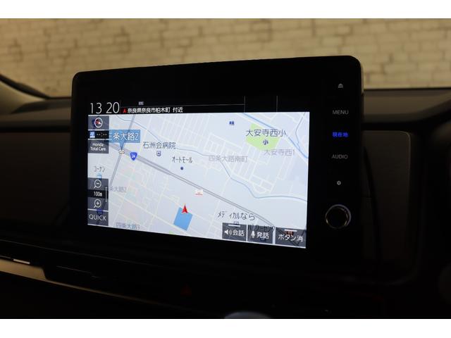 オデッセイハイブリッド ｅ：ＨＥＶアブソルート・ＥＸ　ハイブリッド　ドライブレコーダー　全周囲カメラ　ナビ　ＴＶ　両側電動スライドドア　クリアランスソナー　クルーズコントロール　レーンアシスト　パークアシスト　衝突被害軽減システム　オートライト（4枚目）