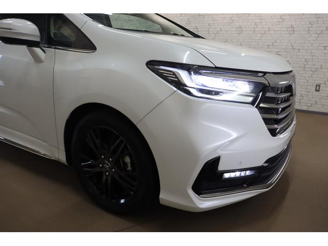 オデッセイハイブリッド ｅ：ＨＥＶアブソルート・ＥＸ　ハイブリッド　ドライブレコーダー　全周囲カメラ　ナビ　ＴＶ　両側電動スライドドア　クリアランスソナー　クルーズコントロール　レーンアシスト　パークアシスト　衝突被害軽減システム　オートライト（24枚目）