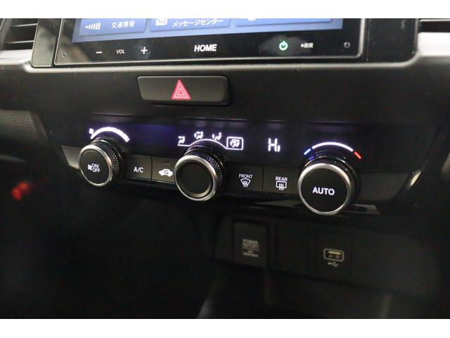 フィット e:HEVホーム バックカメラ クリアランスソナー クルーズコントロール レーンアシスト 衝突被害軽減システム LEDヘッドランプ スマートキー CVT 盗難防止システム 衝突安全ボディ ABS ESC USB(7枚目)