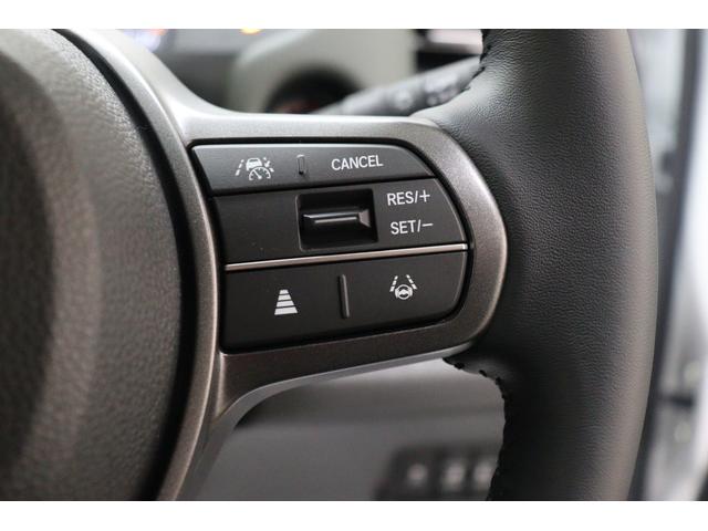 フリード ｅ：ＨＥＶクロスター　ナビ　ＴＶ　クリアランスソナー　クルーズコントロール　レーンアシスト　衝突被害軽減システム　両側電動スライドドア　ＬＥＤヘッドランプ　ヘッドライトウォッシャー　スマートキー　アイドリングストップ（11枚目）