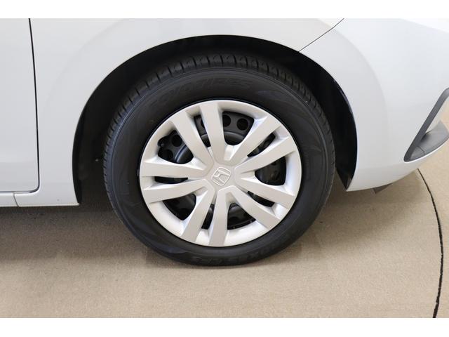 フィット ベーシック　バックカメラ　ナビ　クリアランスソナー　クルーズコントロール　衝突被害軽減システム　オートライト　スマートキー　アイドリングストップ　電動格納ミラー　ＣＶＴ　盗難防止システム　衝突安全ボディ（19枚目）