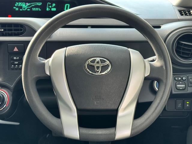 アクア S ドライブレコーダー ETC ナビ TV キーレスエントリー アイドリングストップ 電動格納ミラー シートヒーター CVT 衝突安全ボディ 記録簿 ABS ESC エアコン パワーステアリング(3枚目)