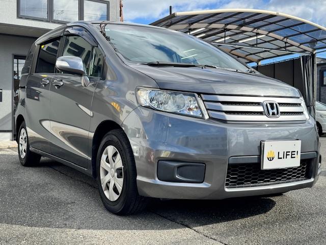 フリードスパイク Ｇ　ジャストセレクション　バックカメラ　ナビ　ＴＶ　オートクルーズコントロール　両側電動スライドドア　スマートキー　電動格納ミラー　ウォークスルー　ＣＶＴ　ＣＤ　ＤＶＤ再生　ＵＳＢ　Ｂｌｕｅｔｏｏｔｈ　ＡＢＳ　ＥＳＣ　エアコン（5枚目）