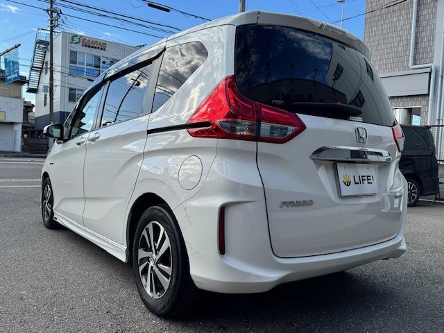 フリードハイブリッド ハイブリッド・Ｇホンダセンシング　ＥＴＣ　バックカメラ　ナビ　ＴＶ　オートクルーズコントロール　レーンアシスト　衝突被害軽減システム　両側電動スライドドア　ＬＥＤヘッドランプ　スマートキー　電動格納ミラー　後席モニター　ＡＴ（19枚目）