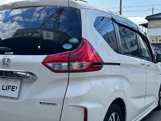 フリードハイブリッド ハイブリッド・Ｇホンダセンシング　ＥＴＣ　バックカメラ　ナビ　ＴＶ　オートクルーズコントロール　レーンアシスト　衝突被害軽減システム　両側電動スライドドア　ＬＥＤヘッドランプ　スマートキー　電動格納ミラー　後席モニター　ＡＴ（28枚目）