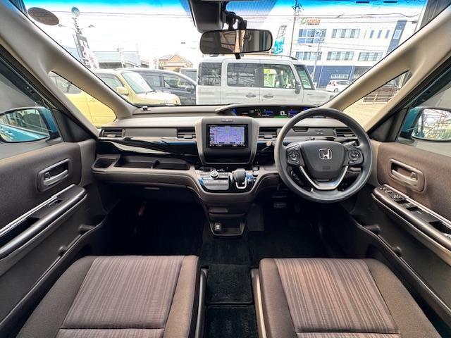 フリードハイブリッド ハイブリッド・Ｇホンダセンシング　ドライブレコーダー　ＥＴＣ　バックカメラ　ナビ　ＴＶ　オートクルーズコントロール　レーンアシスト　衝突被害軽減システム　両側電動スライドドア　ＬＥＤヘッドランプ　スマートキー　電動格納ミラー（2枚目）