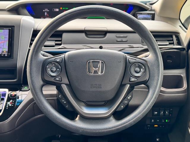 フリードハイブリッド ハイブリッド・Ｇホンダセンシング　ドライブレコーダー　ＥＴＣ　バックカメラ　ナビ　ＴＶ　オートクルーズコントロール　レーンアシスト　衝突被害軽減システム　両側電動スライドドア　ＬＥＤヘッドランプ　スマートキー　電動格納ミラー（3枚目）