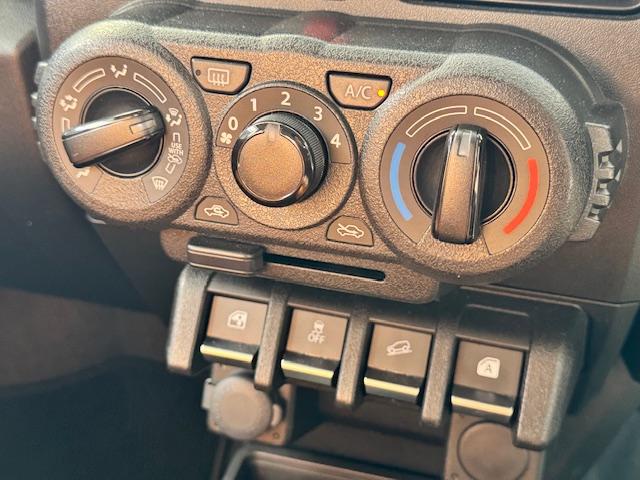 ジムニー ＸＧ　４ＷＤ　ドライブレコーダー　ＥＴＣ　バックカメラ　ナビ　ＴＶ　衝突被害軽減システム　アイドリングストップ　ＭＴ　盗難防止システム　ＡＢＳ　ＥＳＣ　Ｂｌｕｅｔｏｏｔｈ　衝突安全ボディ　エアコン（15枚目）