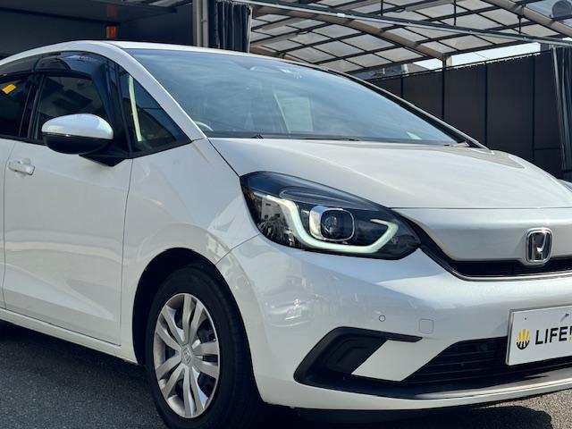 フィット ホーム　ドライブレコーダー　ＥＴＣ　バックカメラ　ナビ　ＴＶ　クリアランスソナー　オートクルーズコントロール　レーンアシスト　アイドリングストップ　電動格納ミラー　チップアップシート　ＣＶＴ　記録簿　ＥＳＣ（25枚目）