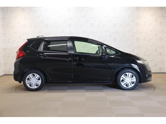 フィット １３Ｇ・Ｆ　ドライブレコーダー　ＥＴＣ　バックカメラ　ナビ　レーンアシスト　衝突被害軽減システム　スマートキー　アイドリングストップ　ＣＶＴ　盗難防止システム　衝突安全ボディ　ＡＢＳ　ＥＳＣ　ＣＤ　ＵＳＢ（14枚目）