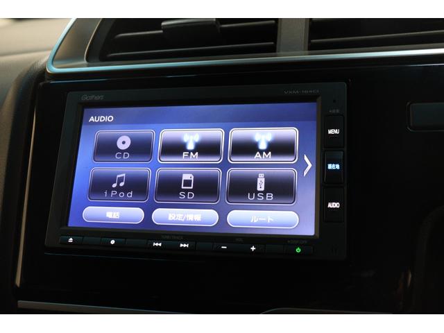 フィット １３Ｇ・Ｆ　ドライブレコーダー　ＥＴＣ　バックカメラ　ナビ　レーンアシスト　衝突被害軽減システム　スマートキー　アイドリングストップ　ＣＶＴ　盗難防止システム　衝突安全ボディ　ＡＢＳ　ＥＳＣ　ＣＤ　ＵＳＢ（22枚目）