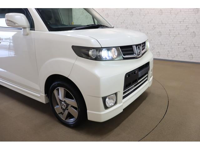 ゼストスパーク Ｗ　ＨＩＤ　スマートキー　ベンチシート　ＡＴ　盗難防止システム　ＡＢＳ　ＣＤ　ミュージックプレイヤー接続可　アルミホイール　衝突安全ボディ　エアコン　パワーステアリング　パワーウィンドウ（22枚目）