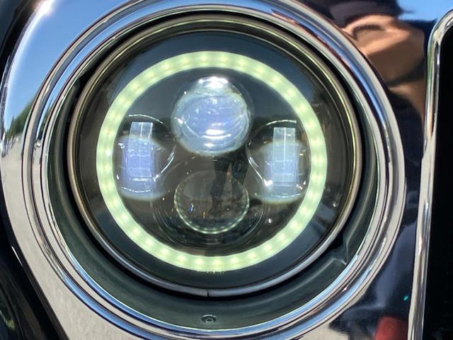 ジープ・ラングラー サハラ　ＡＴ車　ＣＤオーディオ　ＥＴＣ　ＬＥＤイカリングヘッドライト　クルーズコントロール　ＡＣ　社外ＡＷ　２ドアタイプ　　フロントバンパーグリルガード　背面タイヤ　ハードトップ（31枚目）