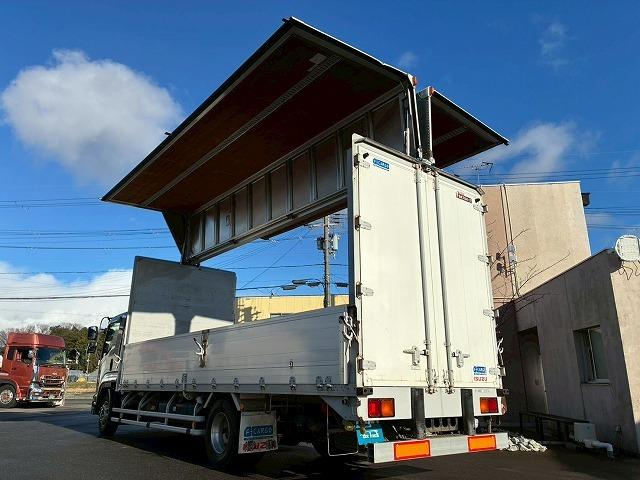 フォワード 　車検整備付　令和８年３月迄　Ｈ２２年式　いすゞ　アルミウイング　ワンオーナー　フルキャブ　ベッド付き　後輪エアサス　日本フルハーフ　６２００　標準幅　６速　ＭＴ　マニュアル　４ｔ　８ｔ　中型（7枚目）