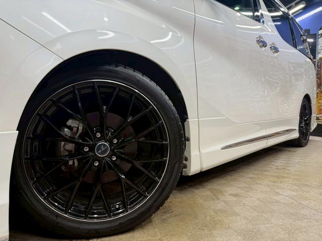 ヴェルファイア ２．５Ｚ　Ａエディション　トヨタセーフティ（禁煙車）（後期型）（モデリスタフルエアロ）（サンルーフ）（両側電動スライドドア）（デジタルインナーミラー）（純正ナビ（レーダークルーズ）（オットマン）（ＥＴＣ）（社外１９インチＡＷ）（55枚目）