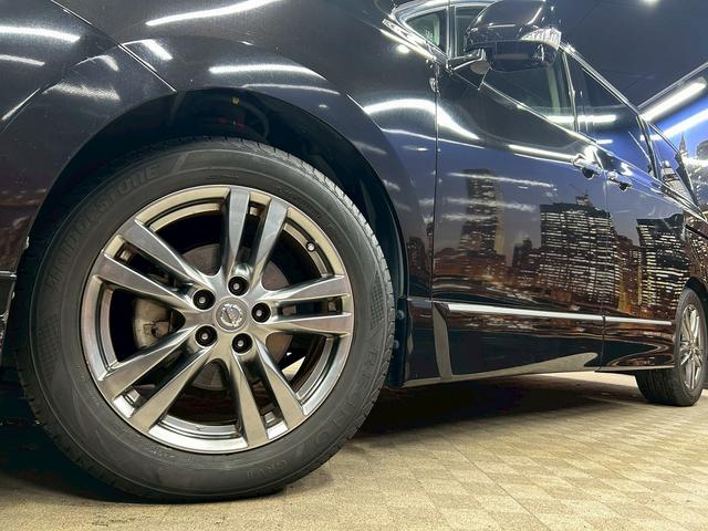 エルグランド 350ハイウェイスターアーバンクロムブラックレザー (黒本革シート)(両側パワースライド)(純正HDDナビ)(アラウンドビューモニター)(レーダークルーズ)(クリアランスソナー)(パワーバックドア)(シートメモリ)(シートヒーター)(純正18AW)(65枚目)