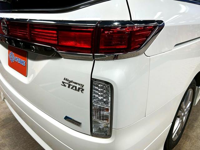 エルグランド 350ハイウェイスター (禁煙車)(黒半革シート)(後席モニター)(8人乗り)(BOSE)(両側パワースライドドア)(純正ナビ)(全周囲モニター)(ビルトインETC)(オットマン)(HIDヘッドライト)(純正18インチAW)(30枚目)