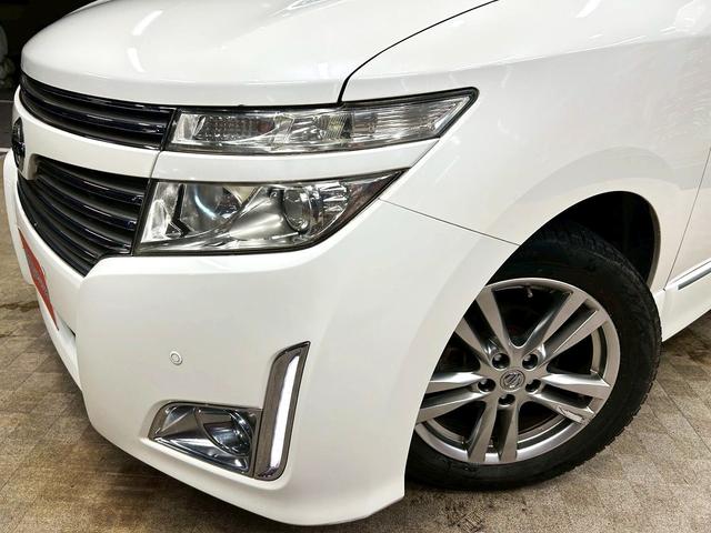 エルグランド 350ハイウェイスター (禁煙車)(黒半革シート)(後席モニター)(8人乗り)(BOSE)(両側パワースライドドア)(純正ナビ)(全周囲モニター)(ビルトインETC)(オットマン)(HIDヘッドライト)(純正18インチAW)(35枚目)