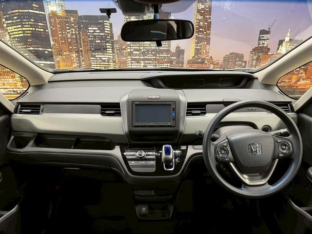 フリード+ハイブリッド ハイブリッドG・ホンダセンシング ホンダセンシング(禁煙車)(後期型)(両側パワースライドドア)(純正SDナビナビ)(レーダークルーズコントロール)(バックカメラ)(LEDヘッドライト)(ビルトインETC)(純正15インチAW)(5枚目)