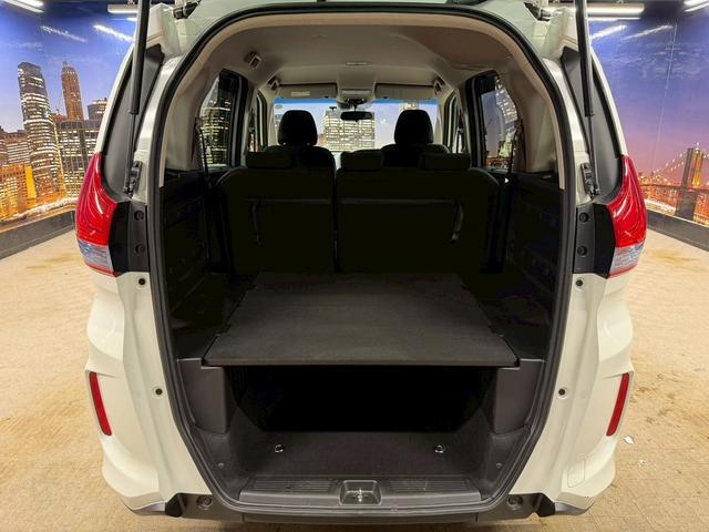 フリード+ハイブリッド ハイブリッドG・ホンダセンシング ホンダセンシング(禁煙車)(後期型)(両側パワースライドドア)(純正SDナビナビ)(レーダークルーズコントロール)(バックカメラ)(LEDヘッドライト)(ビルトインETC)(純正15インチAW)(15枚目)