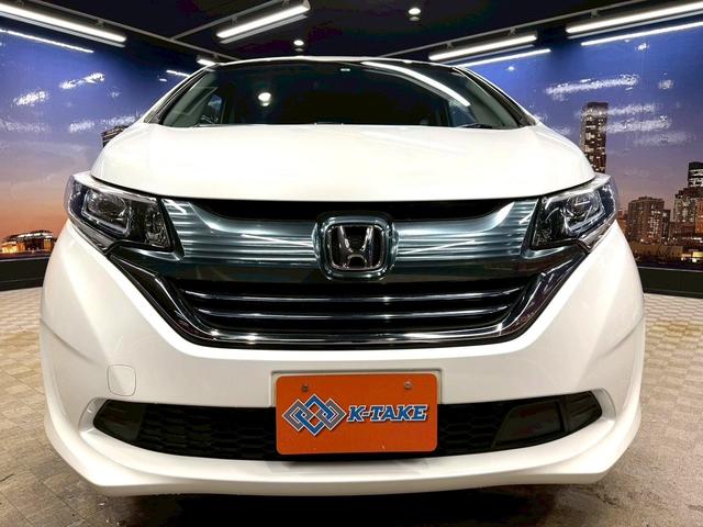 フリード+ハイブリッド ハイブリッドG・ホンダセンシング ホンダセンシング(禁煙車)(後期型)(両側パワースライドドア)(純正SDナビナビ)(レーダークルーズコントロール)(バックカメラ)(LEDヘッドライト)(ビルトインETC)(純正15インチAW)(19枚目)