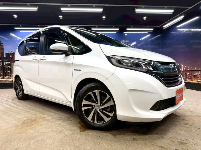 フリード+ハイブリッド ハイブリッドG・ホンダセンシング ホンダセンシング(禁煙車)(後期型)(両側パワースライドドア)(純正SDナビナビ)(レーダークルーズコントロール)(バックカメラ)(LEDヘッドライト)(ビルトインETC)(純正15インチAW)(20枚目)