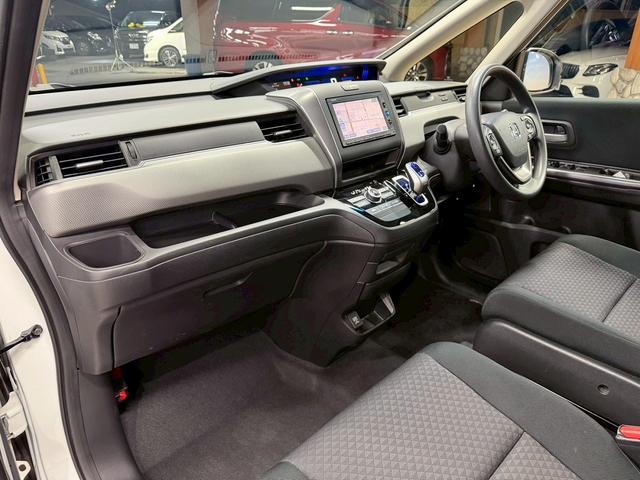 フリード+ハイブリッド ハイブリッドG・ホンダセンシング ホンダセンシング(禁煙車)(後期型)(両側パワースライドドア)(純正SDナビナビ)(レーダークルーズコントロール)(バックカメラ)(LEDヘッドライト)(ビルトインETC)(純正15インチAW)(27枚目)