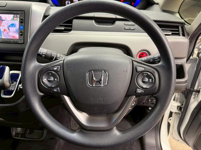 フリード+ハイブリッド ハイブリッドG・ホンダセンシング ホンダセンシング(禁煙車)(後期型)(両側パワースライドドア)(純正SDナビナビ)(レーダークルーズコントロール)(バックカメラ)(LEDヘッドライト)(ビルトインETC)(純正15インチAW)(50枚目)