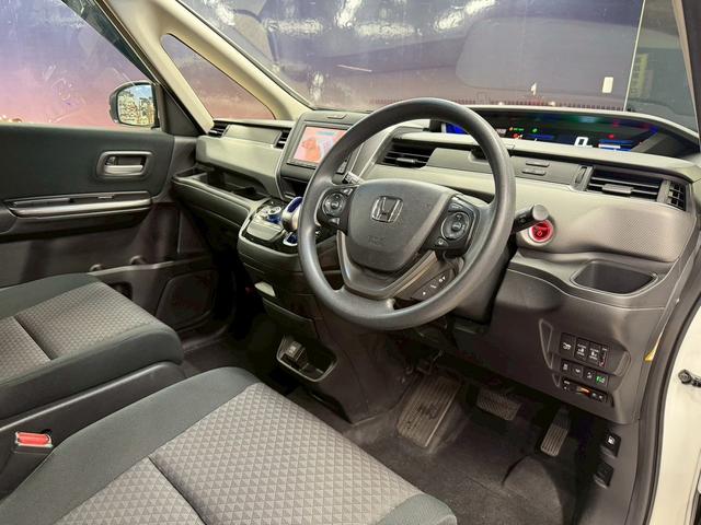 フリード+ハイブリッド ハイブリッドG・ホンダセンシング ホンダセンシング(禁煙車)(後期型)(両側パワースライドドア)(純正SDナビナビ)(レーダークルーズコントロール)(バックカメラ)(LEDヘッドライト)(ビルトインETC)(純正15インチAW)(54枚目)