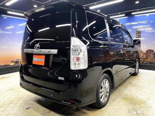 ヴォクシー ZS 煌 (禁煙車)(後期型)(両側パワースライド)(純正HDDナビ)(バックカメラ)(コーナーセンサー)(ビルトインETC)(パドルシフト)(HIDヘッド)(プッシュ&スマートキー)(純正16AW)(21枚目)