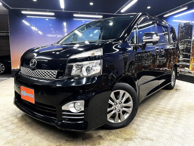 ヴォクシー ZS 煌 (禁煙車)(後期型)(両側パワースライド)(純正HDDナビ)(バックカメラ)(コーナーセンサー)(ビルトインETC)(パドルシフト)(HIDヘッド)(プッシュ&スマートキー)(純正16AW)(23枚目)