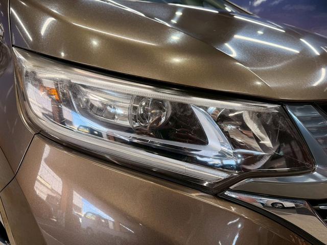 フリードハイブリッド ハイブリッド・Gホンダセンシング ホンダセンシング(禁煙車)(後期型)(黒半革)(6人乗り)(両側パワースライド)(純正ナビ)(レーダークルーズコントロール)(バックカメラ)(LEDヘッド)(ビルトインETC)(純正15インチAW)(14枚目)