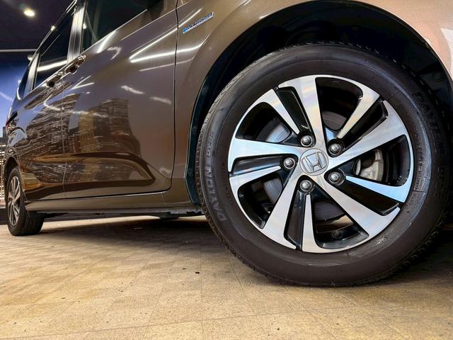 フリードハイブリッド ハイブリッド・Gホンダセンシング ホンダセンシング(禁煙車)(後期型)(黒半革)(6人乗り)(両側パワースライド)(純正ナビ)(レーダークルーズコントロール)(バックカメラ)(LEDヘッド)(ビルトインETC)(純正15インチAW)(15枚目)