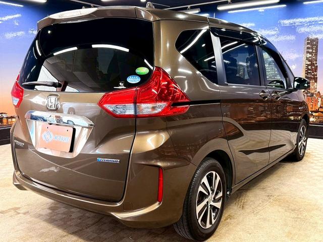フリードハイブリッド ハイブリッド・Gホンダセンシング ホンダセンシング(禁煙車)(後期型)(黒半革)(6人乗り)(両側パワースライド)(純正ナビ)(レーダークルーズコントロール)(バックカメラ)(LEDヘッド)(ビルトインETC)(純正15インチAW)(24枚目)