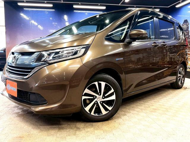 フリードハイブリッド ハイブリッド・Gホンダセンシング ホンダセンシング(禁煙車)(後期型)(黒半革)(6人乗り)(両側パワースライド)(純正ナビ)(レーダークルーズコントロール)(バックカメラ)(LEDヘッド)(ビルトインETC)(純正15インチAW)(27枚目)