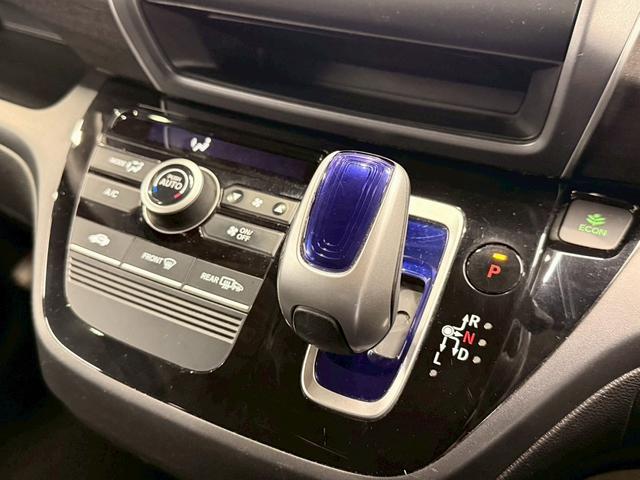 フリードハイブリッド ハイブリッド・Gホンダセンシング ホンダセンシング(禁煙車)(後期型)(黒半革)(6人乗り)(両側パワースライド)(純正ナビ)(レーダークルーズコントロール)(バックカメラ)(LEDヘッド)(ビルトインETC)(純正15インチAW)(33枚目)