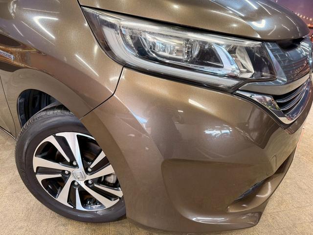 フリードハイブリッド ハイブリッド・Gホンダセンシング ホンダセンシング(禁煙車)(後期型)(黒半革)(6人乗り)(両側パワースライド)(純正ナビ)(レーダークルーズコントロール)(バックカメラ)(LEDヘッド)(ビルトインETC)(純正15インチAW)(61枚目)