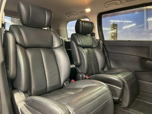 エルグランド ライダー　黒本革シート　パワーシート　（禁煙車）（黒本革シート）（両側パワスラ）（純正フリップ）（純正ＨＤＤナビ）（アラウンドビューモニター）（シートメモリ）（シートヒーター）（ＥＴＣ）（オットマン）（パワーバックドア）（純正１８ＡＷ）（20枚目）