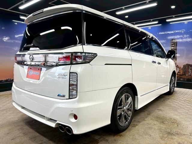 エルグランド ライダー　黒本革シート　パワーシート　（禁煙車）（黒本革シート）（両側パワスラ）（純正フリップ）（純正ＨＤＤナビ）（アラウンドビューモニター）（シートメモリ）（シートヒーター）（ＥＴＣ）（オットマン）（パワーバックドア）（純正１８ＡＷ）（24枚目）