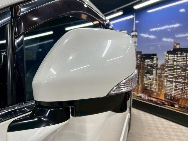 エルグランド ライダー　黒本革シート　パワーシート　（禁煙車）（黒本革シート）（両側パワスラ）（純正フリップ）（純正ＨＤＤナビ）（アラウンドビューモニター）（シートメモリ）（シートヒーター）（ＥＴＣ）（オットマン）（パワーバックドア）（純正１８ＡＷ）（62枚目）