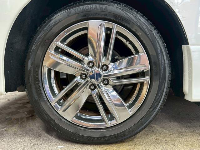 エルグランド ライダー　黒本革シート　パワーシート　（禁煙車）（黒本革シート）（両側パワスラ）（純正フリップ）（純正ＨＤＤナビ）（アラウンドビューモニター）（シートメモリ）（シートヒーター）（ＥＴＣ）（オットマン）（パワーバックドア）（純正１８ＡＷ）（65枚目）