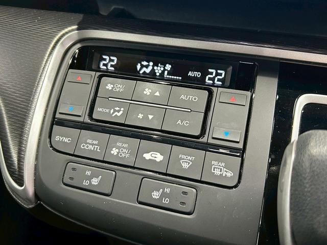 ステップワゴンスパーダ スパーダハイブリッドG・EXホンダセンシングブラスタ (禁煙車)(後期型)(黒半革シート)(後席モニター)(両側パワスラ)(純正ナビ)(バックカメラ)(レーダークルーズ)(シートヒーター)(ビルトインETC)(LEDヘッドライト)(純正16AW)(11枚目)