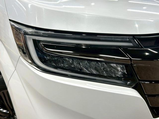 ステップワゴンスパーダ スパーダハイブリッドG・EXホンダセンシングブラスタ (禁煙車)(後期型)(黒半革シート)(後席モニター)(両側パワスラ)(純正ナビ)(バックカメラ)(レーダークルーズ)(シートヒーター)(ビルトインETC)(LEDヘッドライト)(純正16AW)(18枚目)