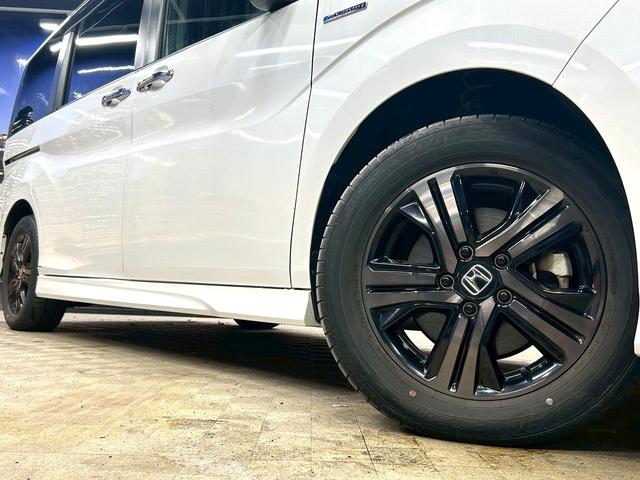 ステップワゴンスパーダ スパーダハイブリッドG・EXホンダセンシングブラスタ (禁煙車)(後期型)(黒半革シート)(後席モニター)(両側パワスラ)(純正ナビ)(バックカメラ)(レーダークルーズ)(シートヒーター)(ビルトインETC)(LEDヘッドライト)(純正16AW)(19枚目)