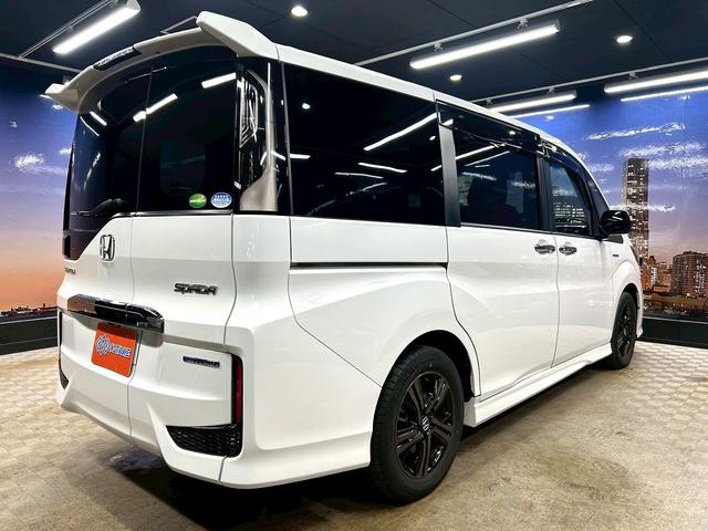 ステップワゴンスパーダ スパーダハイブリッドG・EXホンダセンシングブラスタ (禁煙車)(後期型)(黒半革シート)(後席モニター)(両側パワスラ)(純正ナビ)(バックカメラ)(レーダークルーズ)(シートヒーター)(ビルトインETC)(LEDヘッドライト)(純正16AW)(27枚目)