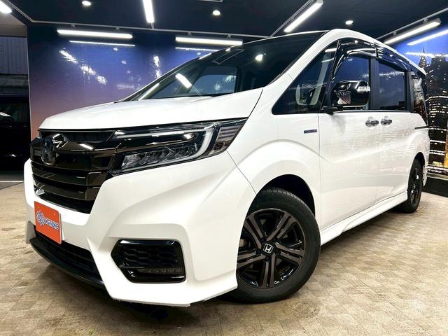 ステップワゴンスパーダ スパーダハイブリッドG・EXホンダセンシングブラスタ (禁煙車)(後期型)(黒半革シート)(後席モニター)(両側パワスラ)(純正ナビ)(バックカメラ)(レーダークルーズ)(シートヒーター)(ビルトインETC)(LEDヘッドライト)(純正16AW)(30枚目)