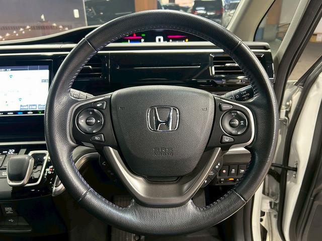 ステップワゴンスパーダ スパーダハイブリッドG・EXホンダセンシングブラスタ (禁煙車)(後期型)(黒半革シート)(後席モニター)(両側パワスラ)(純正ナビ)(バックカメラ)(レーダークルーズ)(シートヒーター)(ビルトインETC)(LEDヘッドライト)(純正16AW)(50枚目)