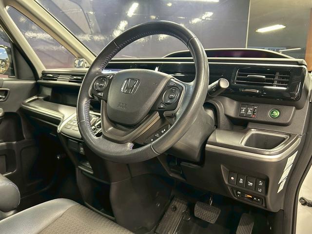 ステップワゴンスパーダ スパーダハイブリッドG・EXホンダセンシングブラスタ (禁煙車)(後期型)(黒半革シート)(後席モニター)(両側パワスラ)(純正ナビ)(バックカメラ)(レーダークルーズ)(シートヒーター)(ビルトインETC)(LEDヘッドライト)(純正16AW)(54枚目)