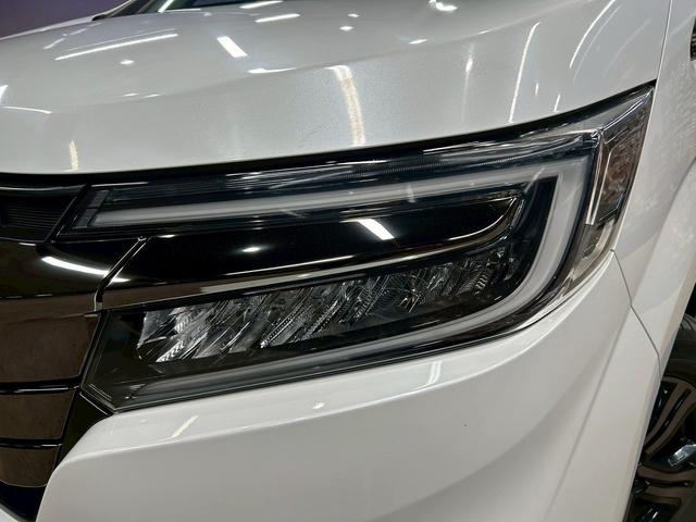 ステップワゴンスパーダ スパーダハイブリッドG・EXホンダセンシングブラスタ (禁煙車)(後期型)(黒半革シート)(後席モニター)(両側パワスラ)(純正ナビ)(バックカメラ)(レーダークルーズ)(シートヒーター)(ビルトインETC)(LEDヘッドライト)(純正16AW)(60枚目)